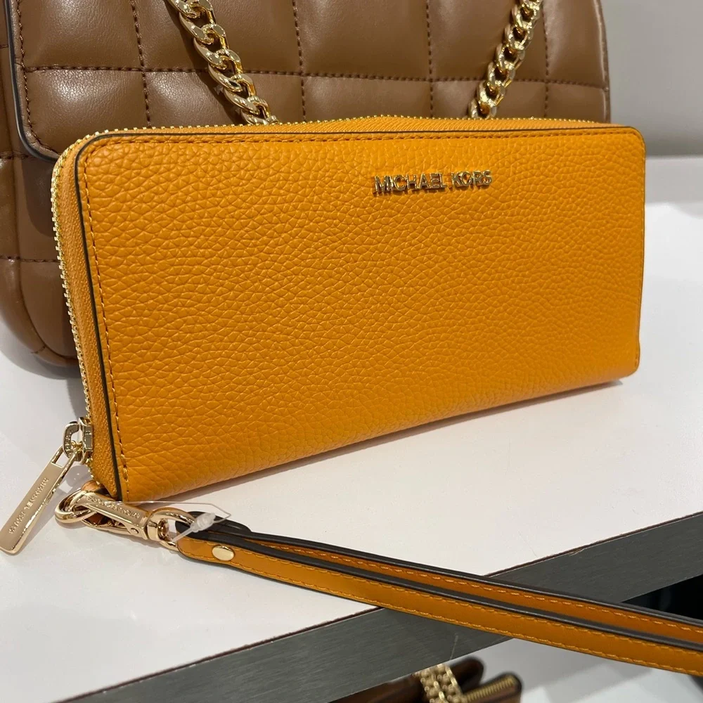 MICHAEL KORS Jet Set Travel Lg Pebbled Leather Continental Wristlet
Rad Orange - Picture 14 of 16
